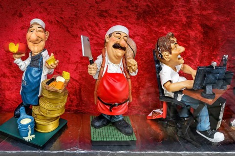 Funny ceramic figurines with different professions