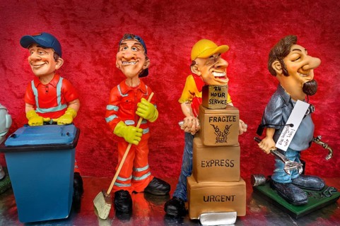Funny ceramic figurines with different professions