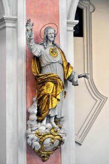 Christ figure with radiating heart