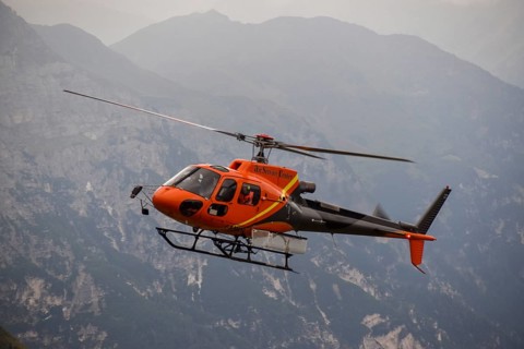 Aerospatiale 350B3 Ecureuil helicopter from the Air Service Centre on a supply flight to the Magdeburger Huette in the Stubai Alps