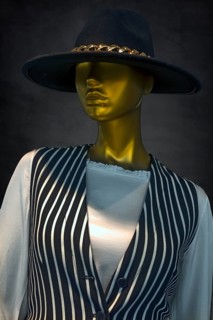 Mannequin with hat in a fashion shop