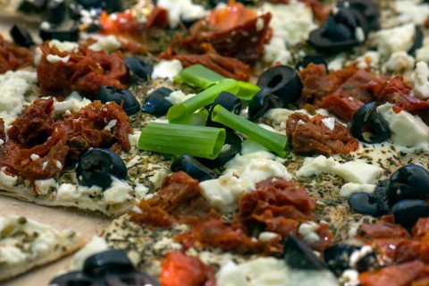 Tarte flambee with sun-dried tomatoes