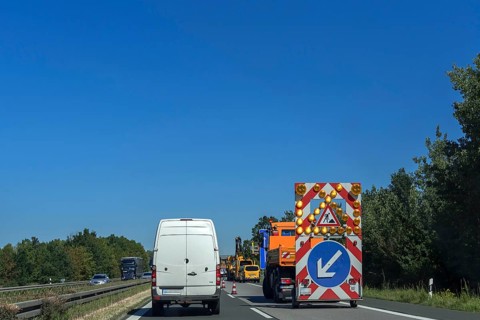 Single lane narrowing due to roadworks vehicle on the A6 motorway