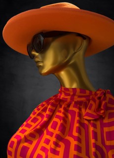 Mannequin with hat and sunglasses in a fashion shop