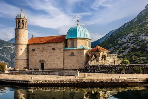 The former seafaring centre of Perast with the beautiful offshore island of Gospa od Skrpjela