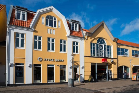 Danish bank in the city centre and typical yellow houses