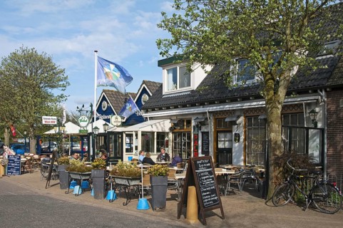 Tourists on pavement cafe at Cocksdorp