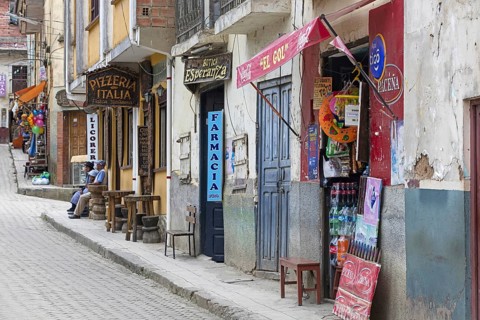 Street with shops and restaurants in Coroico