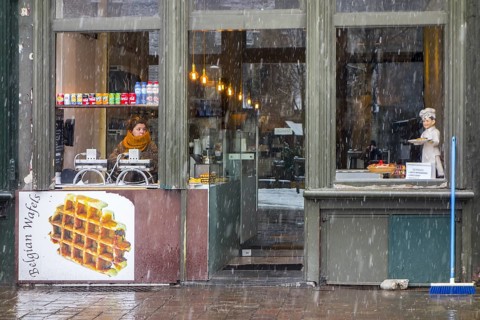 Vendor of Belgian waffles waiting for customers