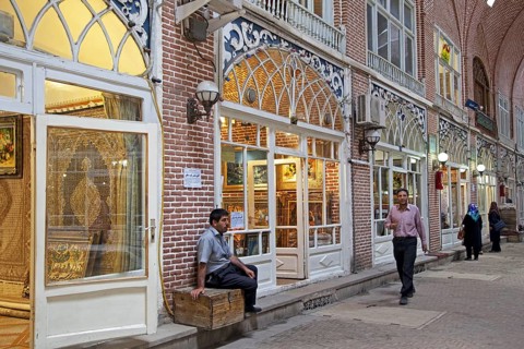 Antiques and carpets for sale in shops in the old historic bazaar of the city Tabriz