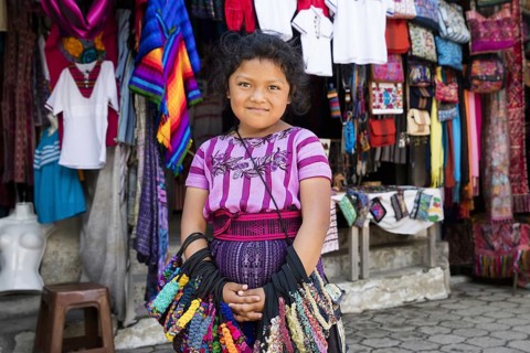 Young Mayan girl selling souvenirs in the town Santiago Atitlan at Lago de Atitlan