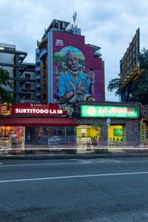 Residential and commercial building with graffiti on the wall