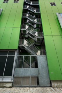 Green facade with external metal staircase in Kempten