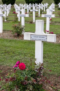 French military cemetery at the Ossuaire de Douaumont with white graves and crosses of fallen soldiers