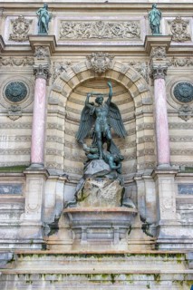Bronze statue of the fountain La Fontaine Saint Michel