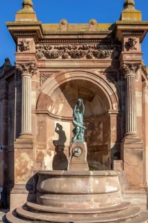Fountain with bronze statue of The Little Winegrower