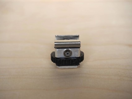 Camera hot shoe adapter