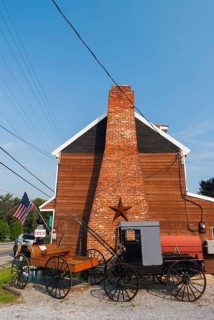House and horse-drawn carriage