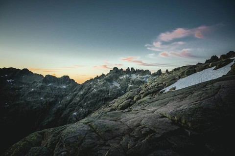 Rocks and snowfields at dawn