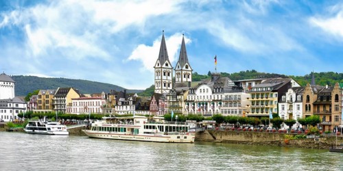 Tourist boat anchored in front of St. Severus Church