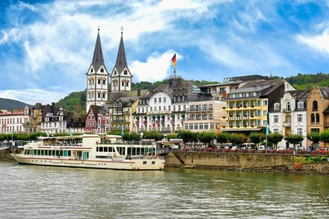 Tourist boat anchored in front of St. Severus Church