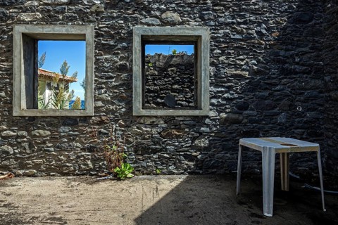 Crumbling wall with window frame