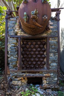 Rusted pressure vessel on a disused factory site