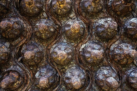 Rusted bolts on a disused factory site