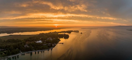 Aerial panorama of western Lake Constance at sunrise with the Mettnau peninsula