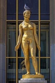 Golden male statue by Felix Alexandre Desruelles