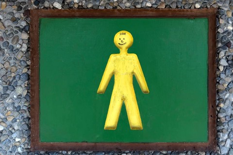 Sign at the men's WC at a motorway car park
