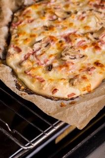 Overhead view baked pizza oven grate