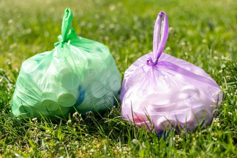 Plastic bags with trash grass
