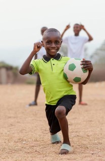 Portrait african child with football ball 2