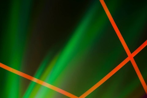 Red neon lines green illuminated dark background
