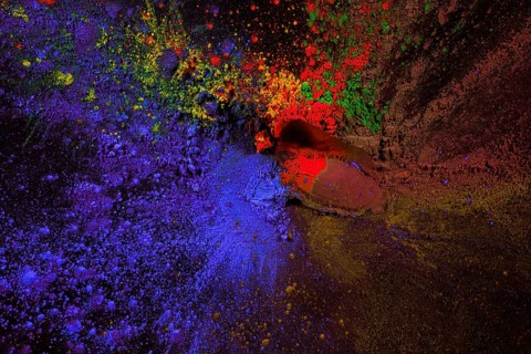 Splatter holi color powder black surface