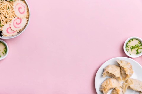 Top view ramen soup dumplings with copy space