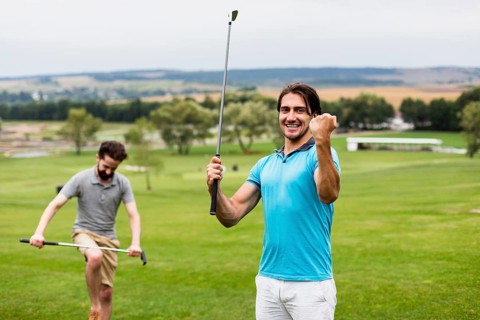 Two men having fun golf course