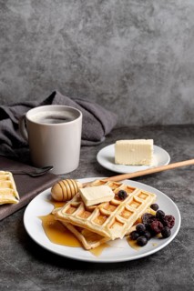 Waffles plate with honey butter