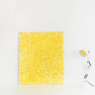 White workspace with yellow picture reading lamp