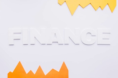 Yellow orange graph with finance text white background