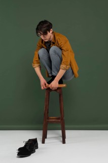 Young man wearing shirt posing chair 3