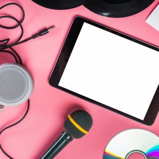 Cd vinyl record microphone speaker digital tablet pink background