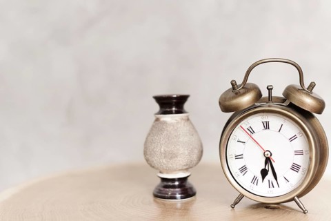 Close up clasic alarm clock nightstand