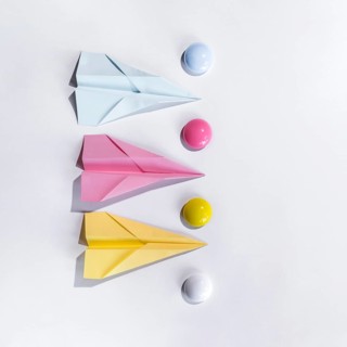 Composition with paper airplane table