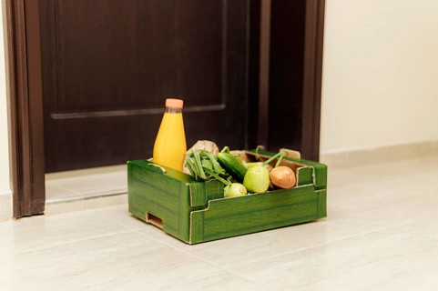 Crate food with juice bottle
