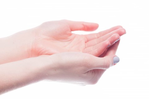 Cupped hands woman