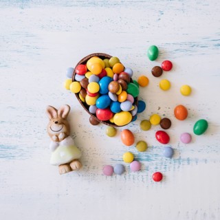 Cute bunny near easter sweets