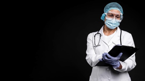 Doctor wearing medical equipment with copy space