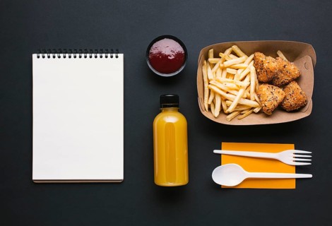 Flat lay assortment with fries notebook